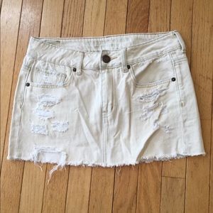 White denim distressed mini skirt